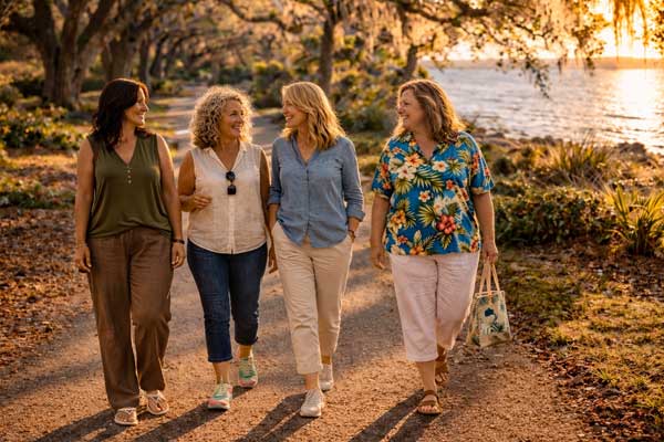 Guests enjoying a scenic, low-impact morning walk during a longevity retreat in Florida.