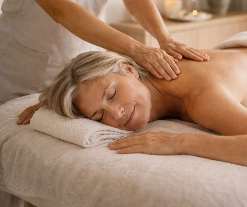 A guest receiving a restorative massage, a key pillar of nervous system regulation at Lorison.
